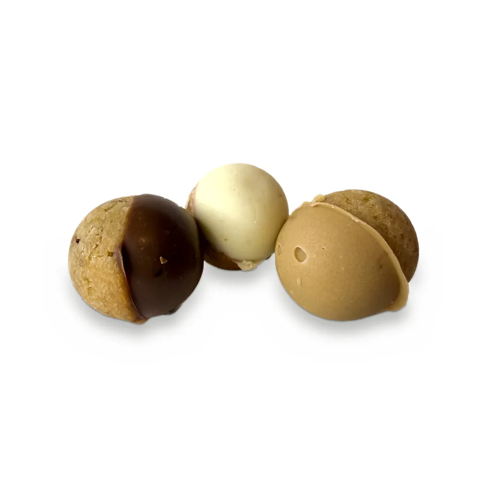 Three cookie pops dipped in dark, white and caramel chocolate