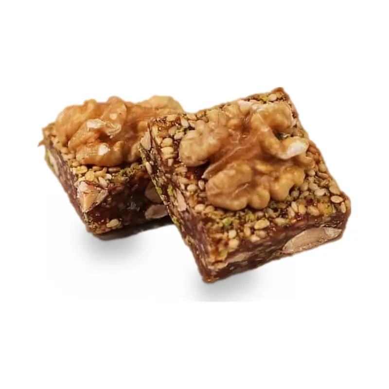 Chocolate squares topped with walnuts
