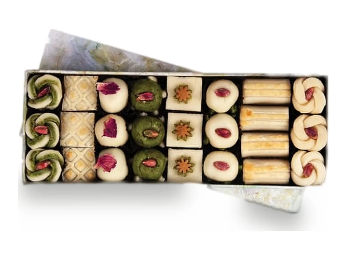 A box of assorted pistachio and rose sweets