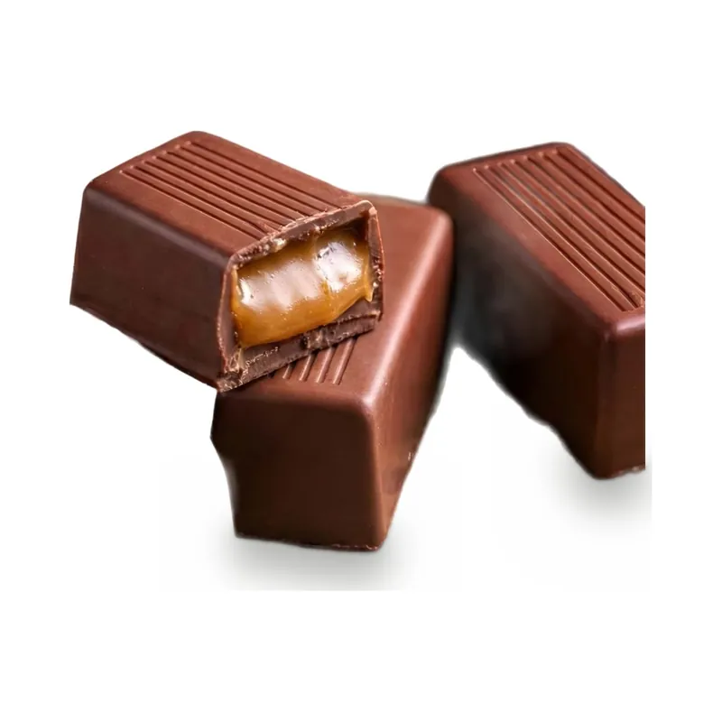 Milk chocolates cut to show a caramel centre