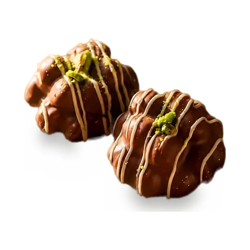 Chocolate nut clusters drizzled with pistachio